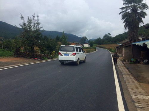 214國道麗江段改建工程基本完工 全線二級路面 設(shè)計(jì)時速60公里