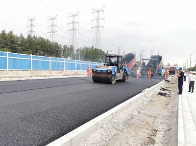 昆陽路越江大橋主線通車 公路與路面工程成果豐碩，年底有望實現行人過橋